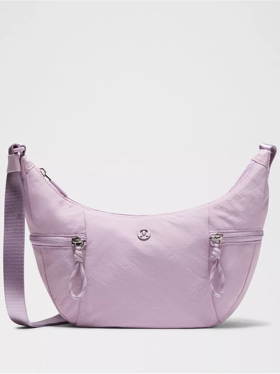 lululemon athletica Handbags - lululemon athletica Lavender Crescent Slouchy Sling Crossbody Bag